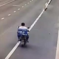 Motorcyclist doesn't see a row of traffic pylons