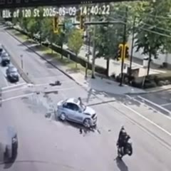 If anyone is interested in how the motorcycle ended up dangling on the street lights