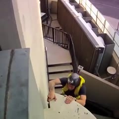 Crazy Douggs and his friends BASE jumping from the elevator of Hotel Bali from Benidorm in Spain