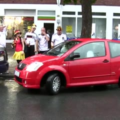 Parking Woman Celebrated by Drunk German Fans