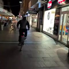 Guy Loses Balance And Crashes in Glass Display While Riding Cycle Without Holding Handles