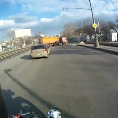 Suzuki SV400 against a gasoline tank truck