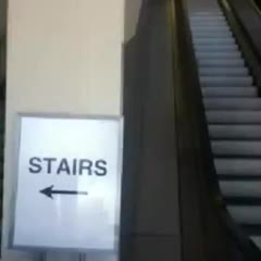 Girl Gets Her Face Smushed On An Escalator!