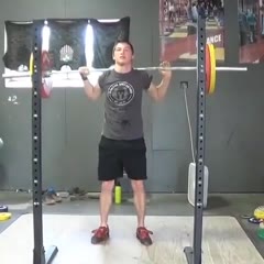 Weightlifter Falls After Dropping the Loaded Barbell
