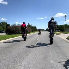 Stunt Rider Makes a Great Save Falling on Asphalt
