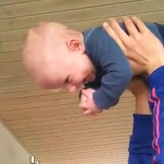 Baby pukes mother in the mouth