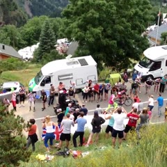 TDF Alpe D'Huez Fan Gets Tripped Chasing Tejay Van Garderen