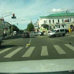 Biker Lands on Car Roof After Crash