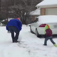 Dad Throws Giant Snowball at Kid