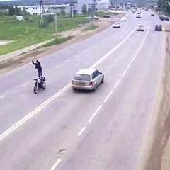 Motorcycle stunt fail on public road