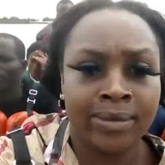 Lady seen struggling with her eyelashes during a boat ride