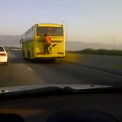 Man Rides Bus Outside