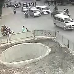 Scooter Man Ends Up In Big Hole After Hitting Multiple Vehicles