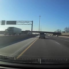 Car Tire Smashes Through Windshield