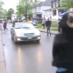 Girl jumps into car at Palmer Fest