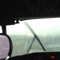 Boeing Business Jet (BBJ) Go-Around in Heavy Rain