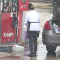 lady puts gas in plastic Bag