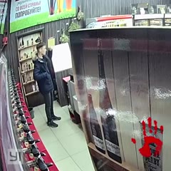 Masked robber with hammer gets beat down in liquor store