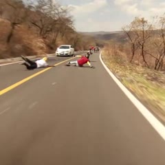 Longboarder Crashes Head First Into Oncoming Car