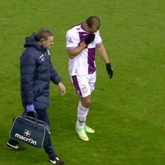 Liverpool fan sees Gabby Agbonlahor fall over avdertising hoardings... whips out his camera!