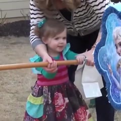 Mama helps piñata