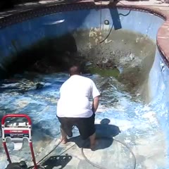 Man Eats it Cleaning Pool