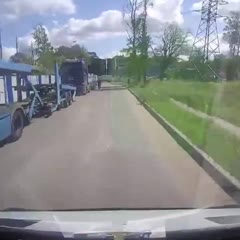 Biker Lands Between Two Crashing Cars