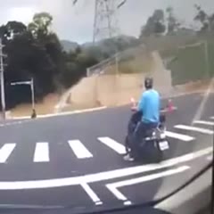 Motorcyclist is having a very bad day