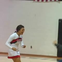 Cheerleader half-court trick shot...