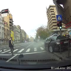 BMW Fleeing From Police Loses Control and Crashes