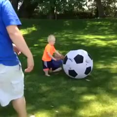 Dad of the year plays soccer with children