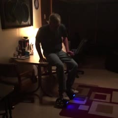 My dad trying his hoverboard present.