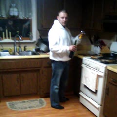 Drunk man opening wine!!!