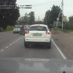 Angry Russian man smashes other driver's cell phone