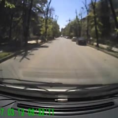 Car flipped over by Manhole Cover