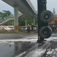 Truck split into two by bridge