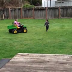 Little girl runs over her little brother with car