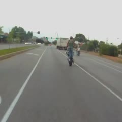 Police Rip Biker off Motorcycle After Wrecking Wheelie in Front of Cop