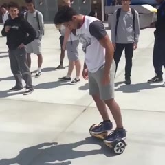 Guy Tries to Front Flip off Hoverboard