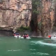 Giant rock formation falls on boats in Capitolio, state of Minas Gerais, Brazil