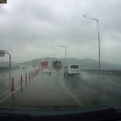 Sliding Car Sends Truck Careening Off Highway