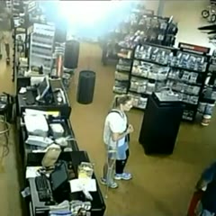 CCTV: Car crashes through bike shop window